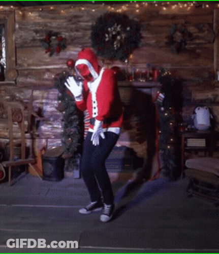 Man In Santa Costume Sitting In Chair GIF