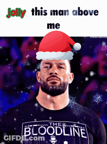 Man In Santa Hat And Bloodline Shirt GIF