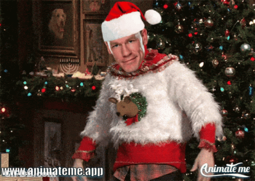 Man In Santa Hat And Ugly Christmas Sweater GIF