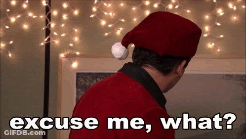 Man In Santa Hat Asking Excuse Me What GIF