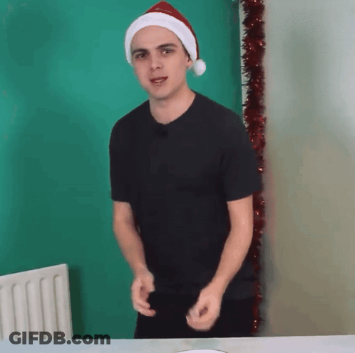Man In Santa Hat Dancing GIF