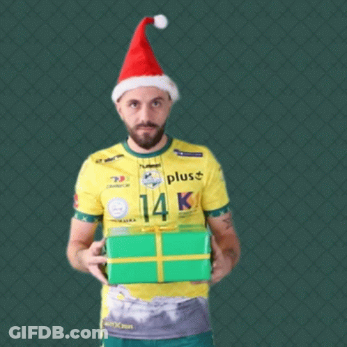 Man In Santa Hat Holding Green Gift Box GIF