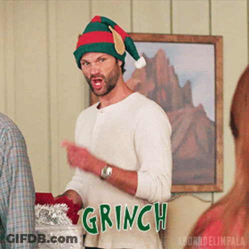 Man In Santa Hat Says Grinch GIF