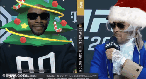 Man In Santa Hat Talking Into Microphone GIF