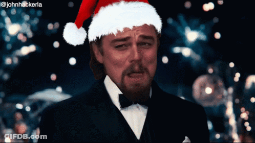 Man In Santa Hat With Hashtag Johnhackeria GIF