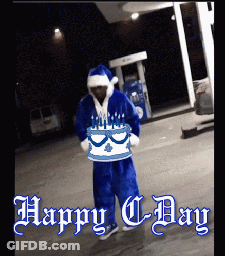 Man In Santa Suit Holding Birthday Cake Saying Happy C Day GIF