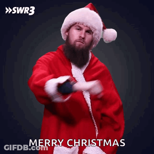 Man In Santa Suit Saying Merry Christmas GIF