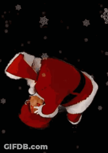 Man In Santa Suit Says Merry Christmas GIF
