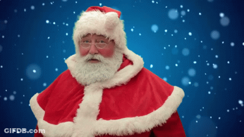 Man In Santa Suit With Glasses And White Beard GIF
