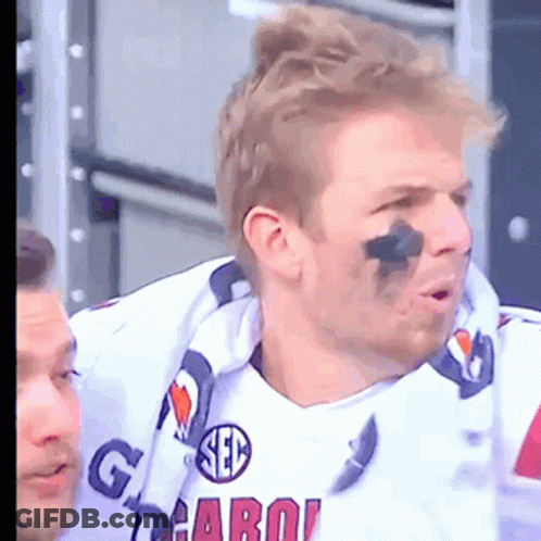 Man In Scarf And SEC Shirt GIF