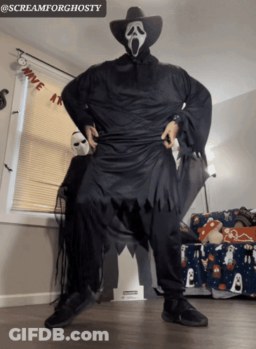 Man In Scream Costume With Have At Banner GIF