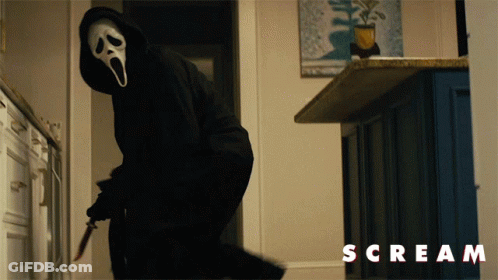 Man In Scream Mask Holding Knife GIF
