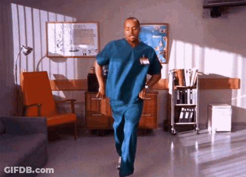 Man In Scrubs Dancing In Hospital GIF