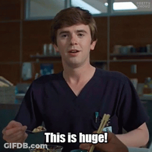 Man In Scrubs Holding Spoon And Chopsticks Saying This Is Huge GIF
