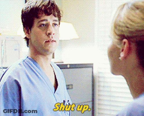 Man In Scrubs Telling Woman Shut Up GIF