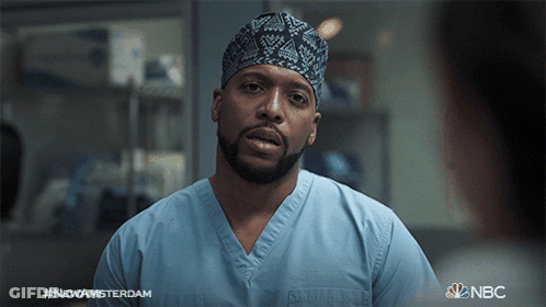 Man In Scrubs With NBC Logo Hat GIF