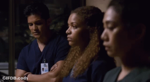 Man In Scrubs With Surgical Assistant Name Tag GIF