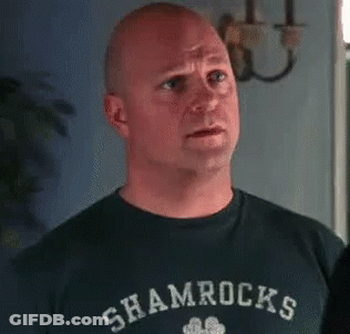 Man In Sea Ocks Shirt Holding Beer GIF