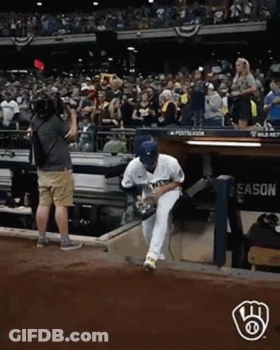 Man In Seahawks Shirt Holding Head GIF