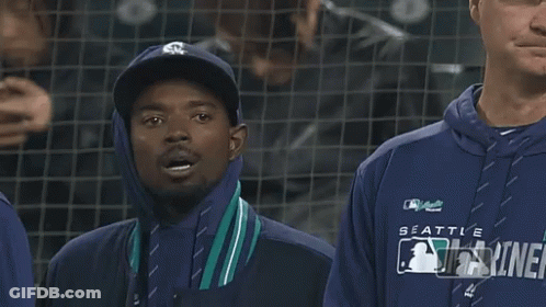 Man In Seattle Mariners Sweatshirt Smiling GIF
