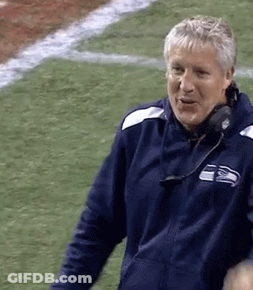 Man In Seattle Seahawks Jacket On Football Field GIF