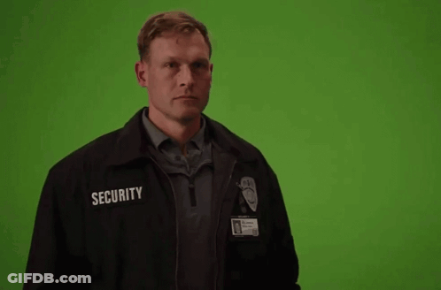Man In Security Jacket With Word Security GIF