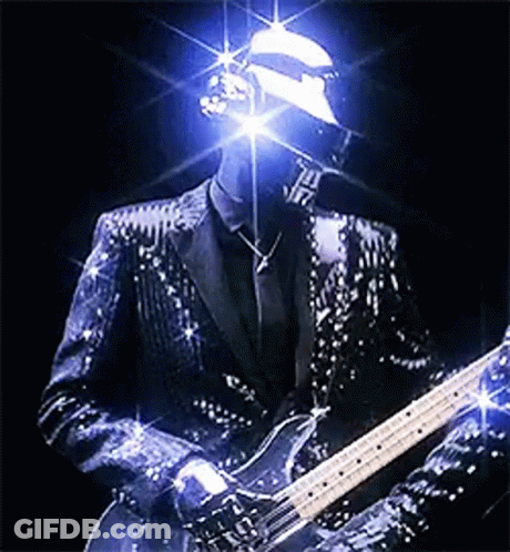 Man In Sequined Suit Playing Guitar GIF