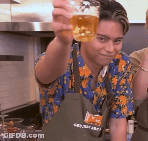 Man In Servise Apron Holding Beer GIF