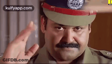 Man In Sheriff Uniform Carrying Trash Bag GIF