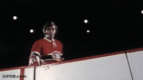 Man In Sheriff Uniform Holding Gun In Pocket GIF