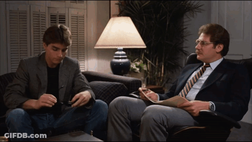 Man In Shirt And Socks Dancing By Stairs GIF