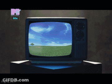 Man In Shirt And Tie On Blue Couch GIF