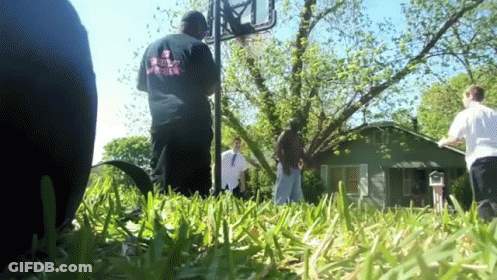 Man In Shirt Saying Jesus Loves You In Grass GIF