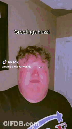 Man In Shirt With Letter T GIF