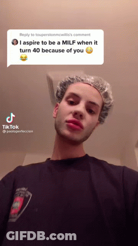 Man In Shower Cap Aspires To Be A MILF At 40 GIF