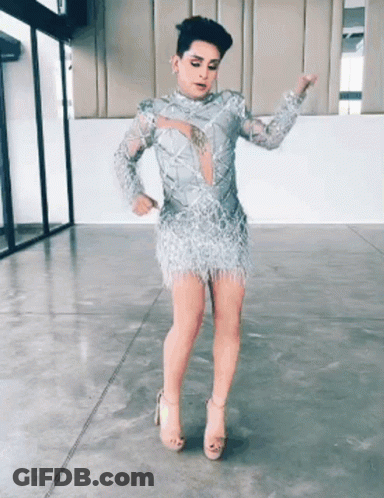Man In Silver Dress And Heels Dancing GIF