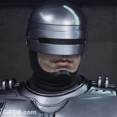 Man In Silver Helmet Close Up GIF
