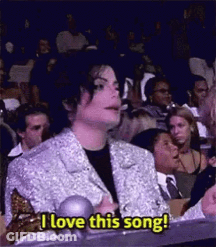 Man In Silver Jacket Saying I Love This Song GIF