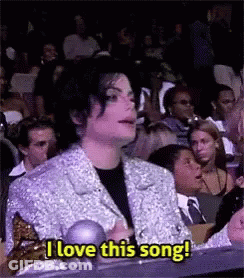 Man In Silver Jacket Says I Love This Song GIF