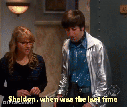 Man In Silver Jacket Standing Next To Woman Sheldon When Was The Last Time GIF