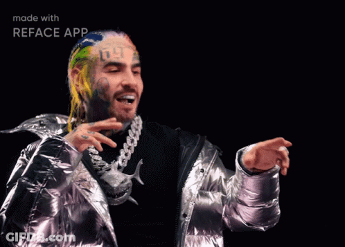 Man In Silver Jacket With 09 Face Tattoo GIF