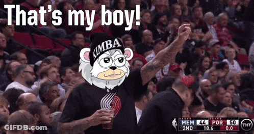 Man In Simba Hat In Crowd GIF