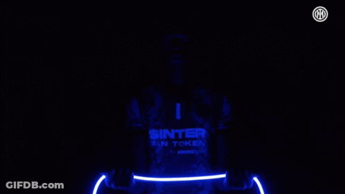 Man In Sinter Fan Token Jersey Holding Light GIF