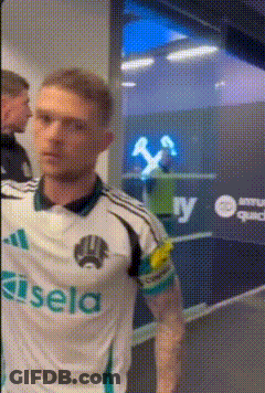 Man In Sisela Jersey In Front Of Window GIF