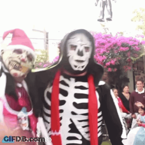 Man In Skeleton Costume With Red Scarf GIF
