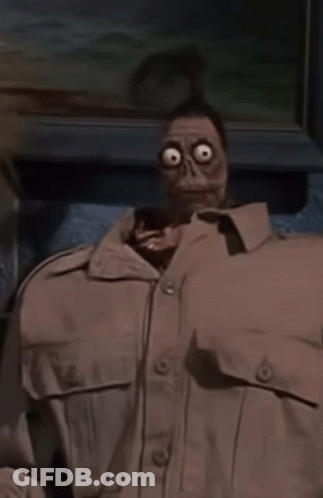 Man In Skeleton Mask And Tan Shirt GIF