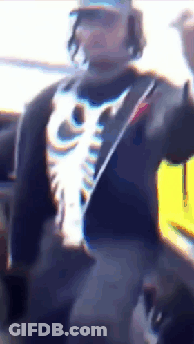 Man In Skeleton Shirt And Hat GIF