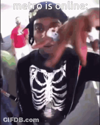 Man In Skeleton Shirt And Hat On Bus GIF