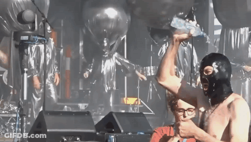 Man In Ski Mask Holding Another Man's Arm GIF