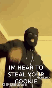 Man In Ski Mask Holding Gun Im Hear To Steal Your Cookie GIF